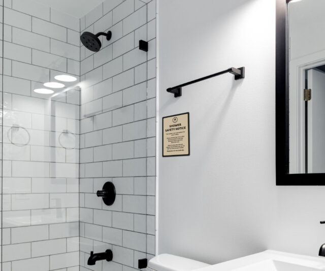 en046 en047 shower safety notices